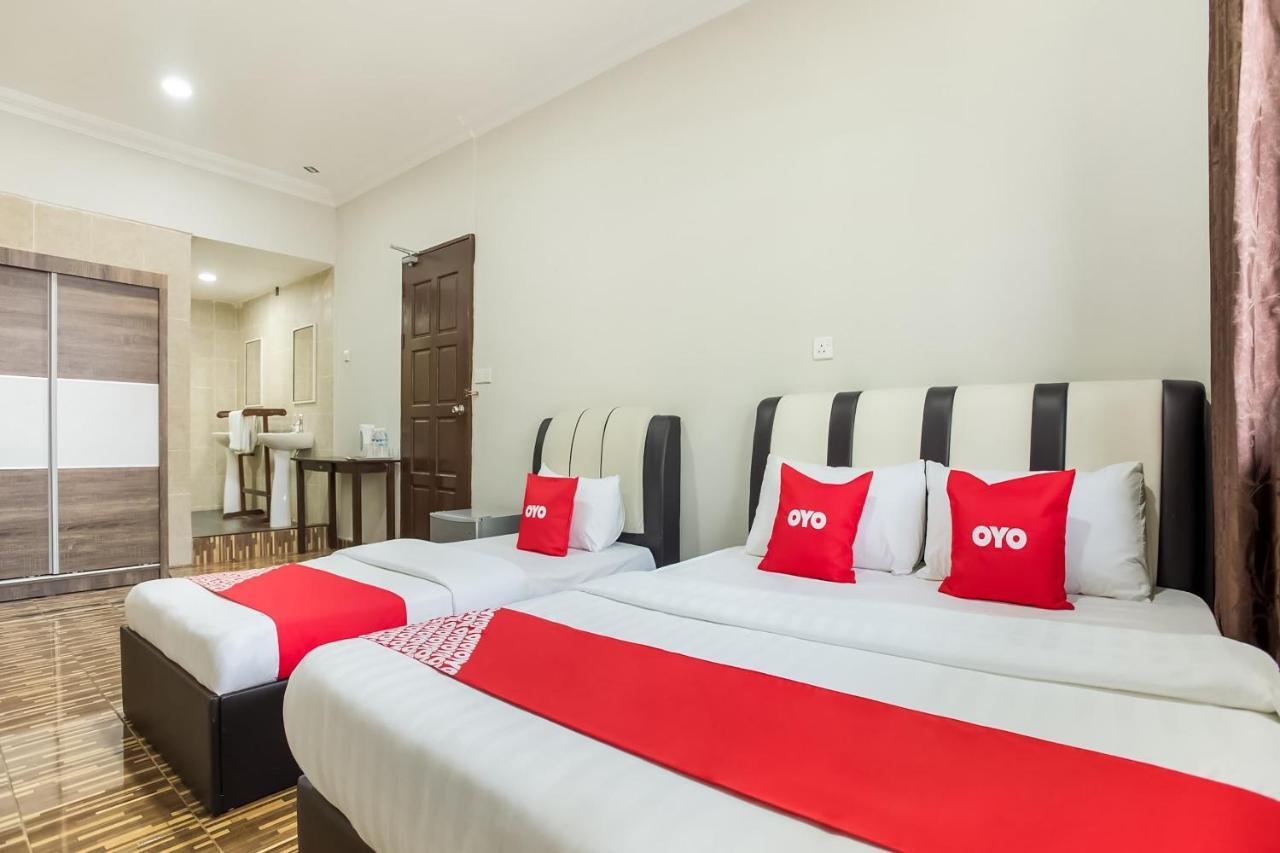 Oyo 89712 Grand Inn Semporna Bagian luar foto